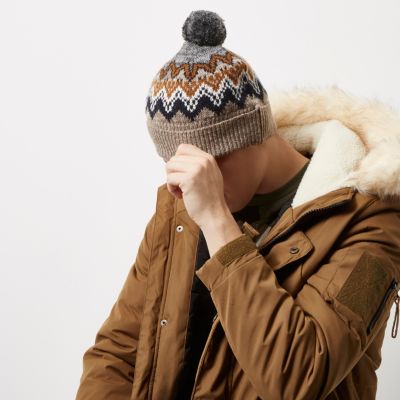 Light brown Fairisle knit bobble hat